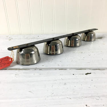 Sleigh bells mounted on a metal bar - 1940s vintage bells 
