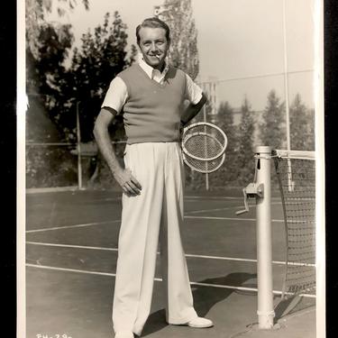 Vintage Hollywood Press Photograph Paul Henreid (Casablanca) Smoking with Tennis Rackets by Gaston Longet 1941 RKO Radio Pictures 