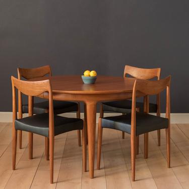 Vintage Round Danish Expandable Teak Dining Table by Johannes Andersen 