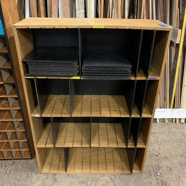 Four level shelving/organizer unit with individual slots, W35 1/2 x H48 5/8 x D 11 1/2”