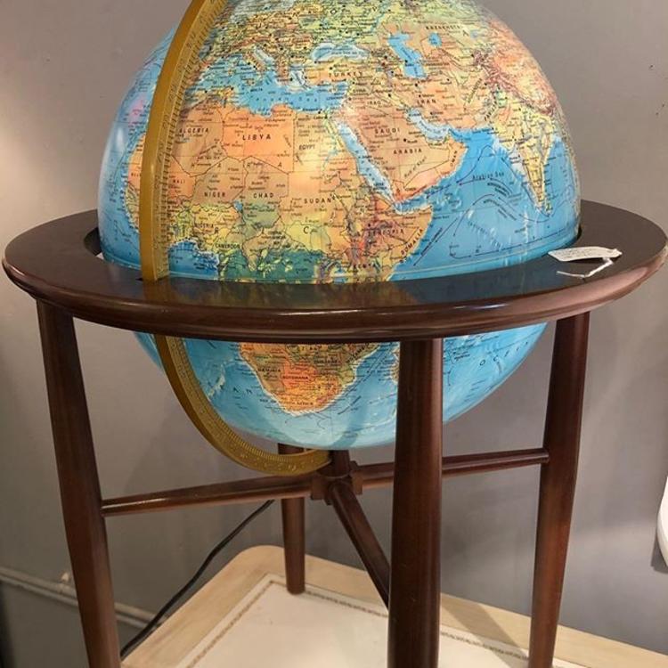                   lighted globe on stand