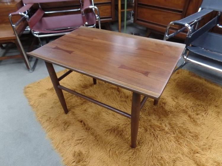Mid-Century Modern walnut side table with rosewood bowties