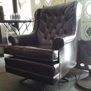 Tufted wing back swivel lounge chair has its Modernist creds also!  Take it for a spin at Hunted House.