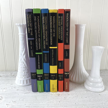 Rainbow book stack of vintage 1970s medical books - Saunders Co. Ltd. publishing 