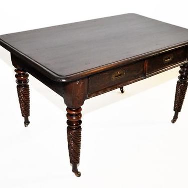 British Colonial Desk with Two Drawers and Twist Legs with Casters | c. 1910