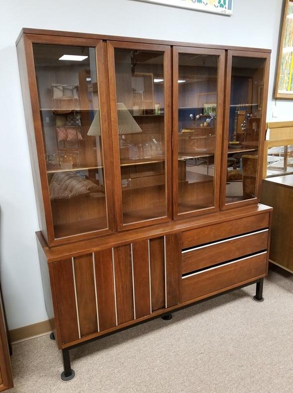                   Mid-Century Modern walnut china cabinet with chrome accents