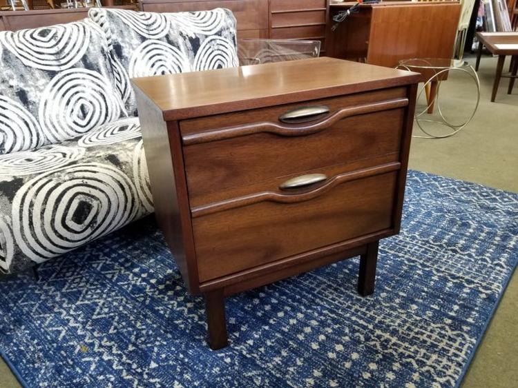                   Mid-Century Modern nightstand with sculpted fronts