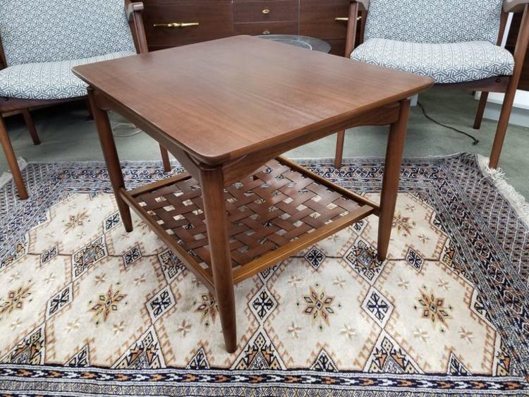 Mid-Century Modern walnut side table with woven lower shelf