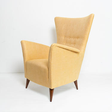 Scandinavian upholstered wing back lounge chair in Gold fabric