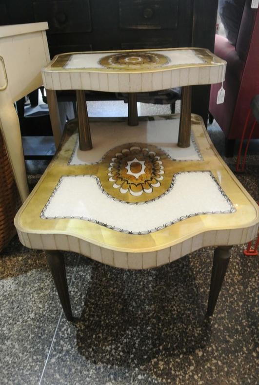 Ornate step-end table. $75