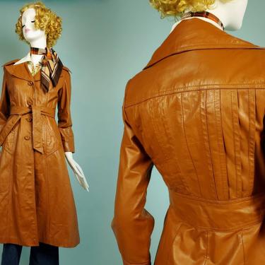 70s long leather coat. Belted with pleated back. Animated iconic collar. Caramel brown. (Size S) 
