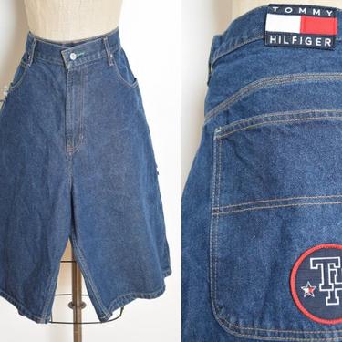vintage 90s jean shorts Tommy Hilfiger denim spell out logo patch carpenter 38 clothing 