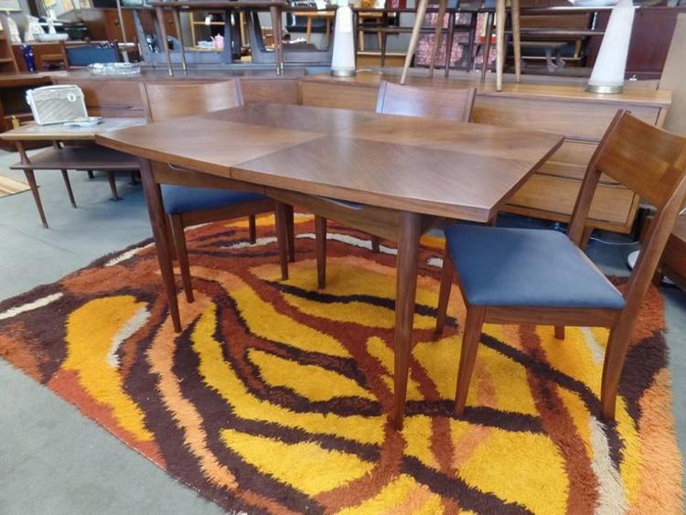 Mid Century Modern walnut boat shape table by American of Martinsville