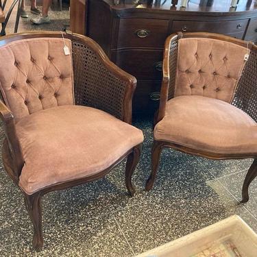Two dusty mauve, velvet with cane sides chairs. 24” x 26” x 30” seat height 17”