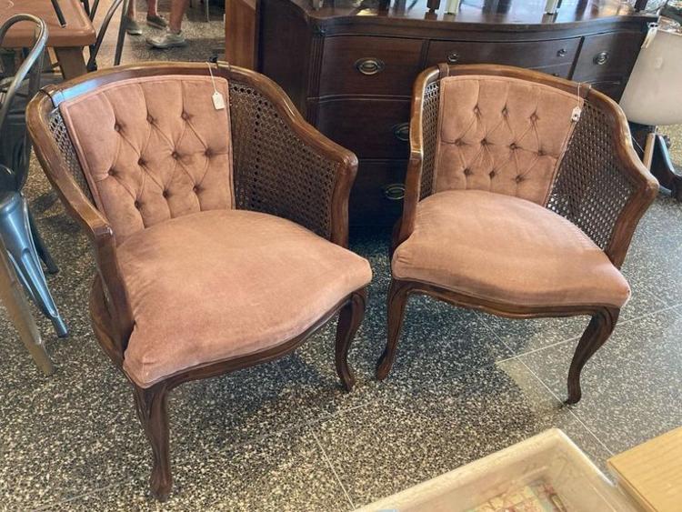 Two dusty mauve, velvet with cane sides chairs. 24” x 26” x 30” seat height 17”