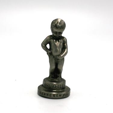 vintage manneken pis metal statuette 