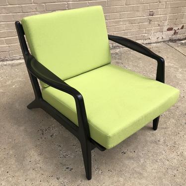 Vibrant green and black lounge chair