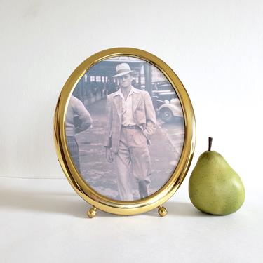 Vintage 8x10 Oval Brass Frame with a Fabric Back 