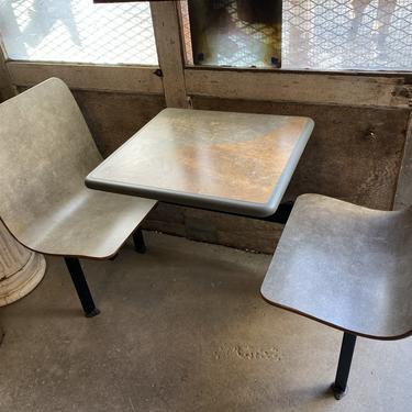 Plymold brand restaurant seating. 23” x 24" table top