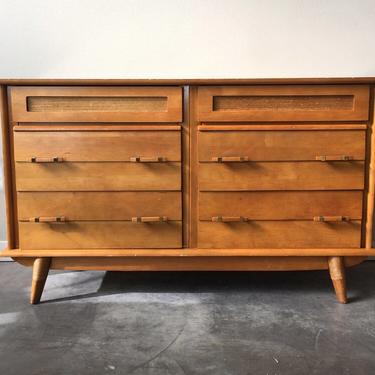 vintage mid century modern lowboy dresser with reed accents.