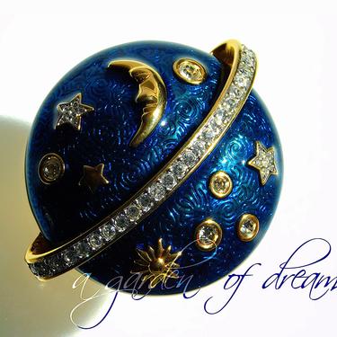 Swarovski Celestial Brooch moon sun stars planets signed swan deep teal blue guilloche enamel with Austrian crystals mint condition retired 