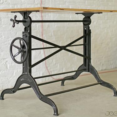 rare and scarce vintage industrial adjustable height and tilt cast iron drafting table by Dietzgen with restored wood top 