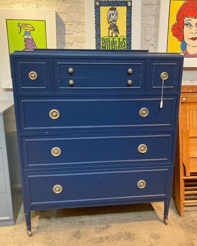 Navy painted 7 drawer chest on wheels! 39” x 21” x 47” 