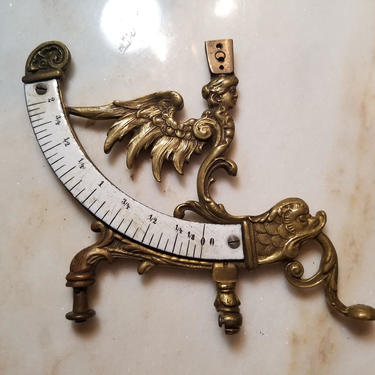 Portion of an Antique Bronze Postal Scale with Porcelain Ruler and Art Nouveau Figural Head 
