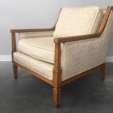 vintage mid century modern gold lounge chair.