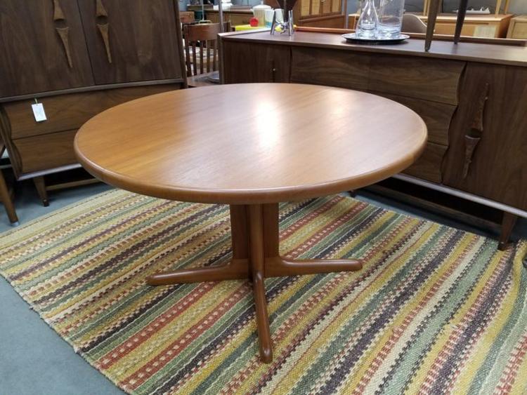 Danish Modern Round dining table with 2 20" leaves