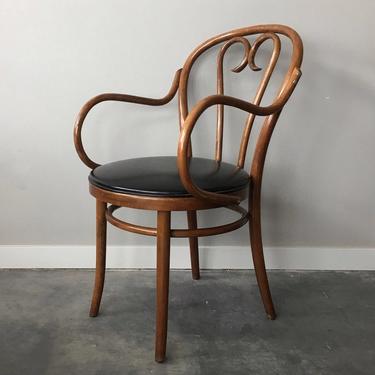 vintage mid century modern bent wood arm chair.