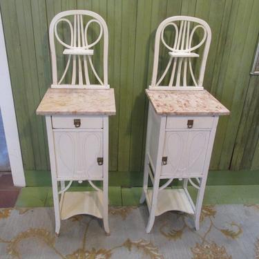 A Pair of French Marble-Topped Nightstands
