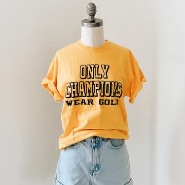 ONLY CHAMPIONS &lt;BR&gt; WEAR GOLD TEE