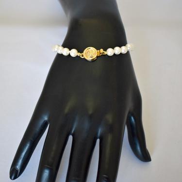 60's Givenchy faux pearl gold plated metal haute couture wedding bracelet, elegant classic hand knotted white beads designer bride bracelet 