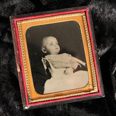 Post Mortem Tintype of a Baby with Tied Wrists in a Case, Sixth-Plate 