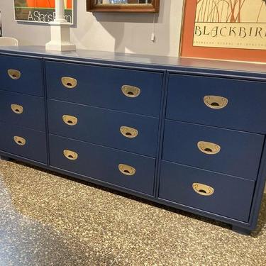 Navy painted campaign style triple dresser. 66” x 19” x 29.5”