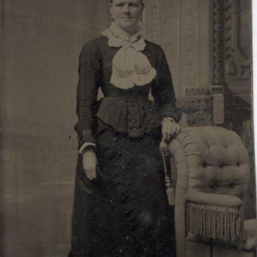 Tintype Photograph of a Woman Standing Next to a Chair 