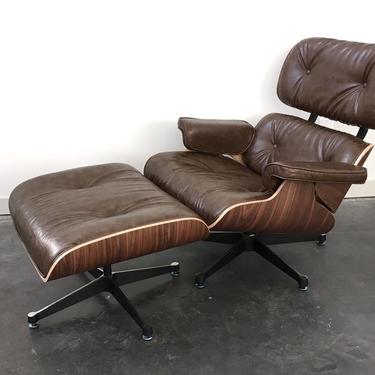 Eames replica lounge chair + ottoman.