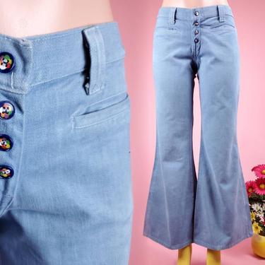 1970s bell bottom jeans. Vintage hip huggers with the cutest buttons. Novelty. (28 x 30) 