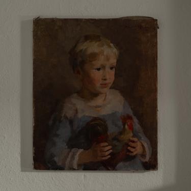 Portrait of Boy Holding Toy Rooster
