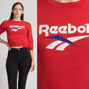 90s Reebok Crop Top Sweatshirt - Petite XS | Vintage Streetwear Red Spell Out Logo Pullover 