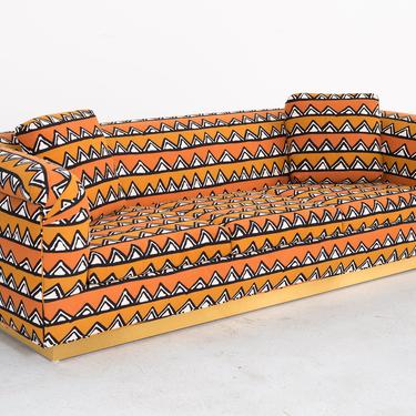 Rounded Barrel Back Brass Platform Sofa Reupholstered in African Mud Cloth 