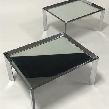 Pair of vintage mid century modern chrome tables with mirror tops in the style of Milo Baughman 