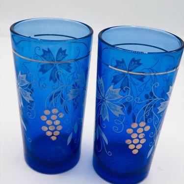 Vintage  Pair Cobalt Blue Glass Juice Tumblers with white and gold floral grape design. 