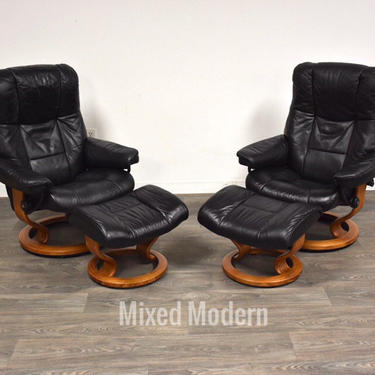 Black Leather and Teak Ekornes Lounge Chairs and Ottomans - A Pair 