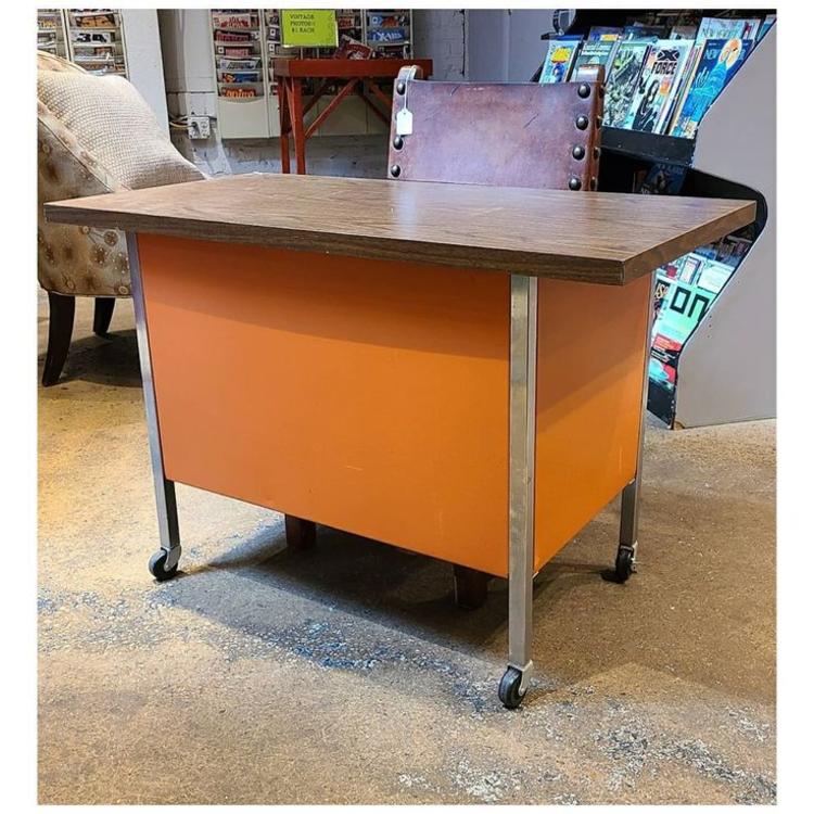 Tiny executive desk / orange / chrome on wheels 40" long / 20" wide / 26" height 