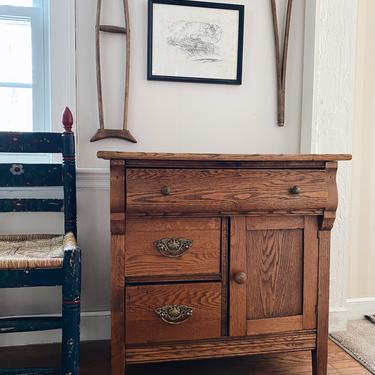 Oak cabinet with three drawers 