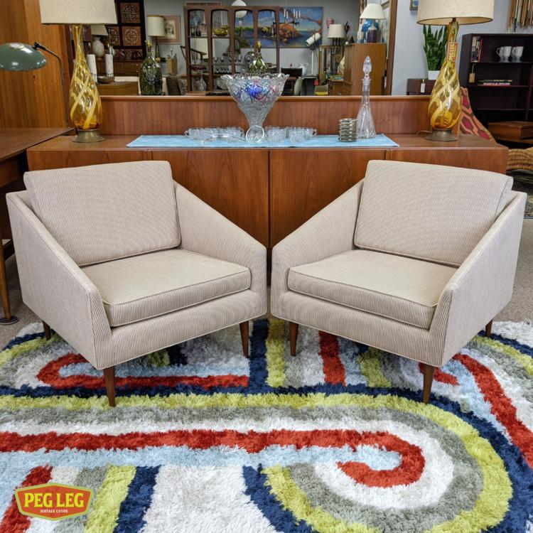 Pair of Mid-Century Modern upholstered lounge chairs