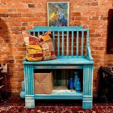 Bright blue hallway bench made from reclaimed wood