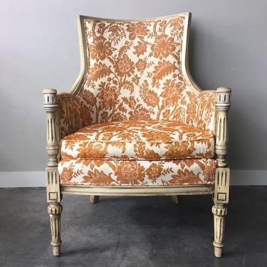 vintage orange floral high back chair.